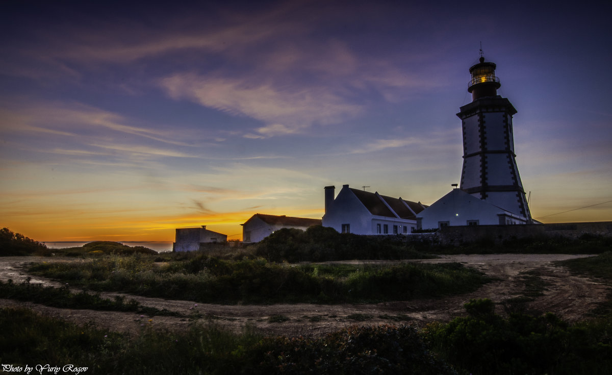 Lighthouse. Cape Espichel. Portugal - Yuriy Rogov