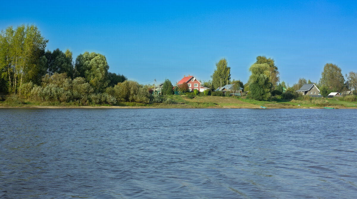 The village of Pakhotino from the side of the Sukhona River on a September day | 16. - Sergey Sonvar