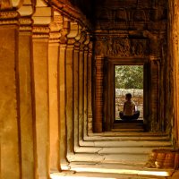 Gallery with pillars at the Ta Prohm temple, Cambodia :: Nick K