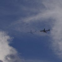 Тень на облаках от самолета :: Сергей Швечков